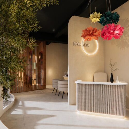 Dear Skin reception desk with illuminated signage